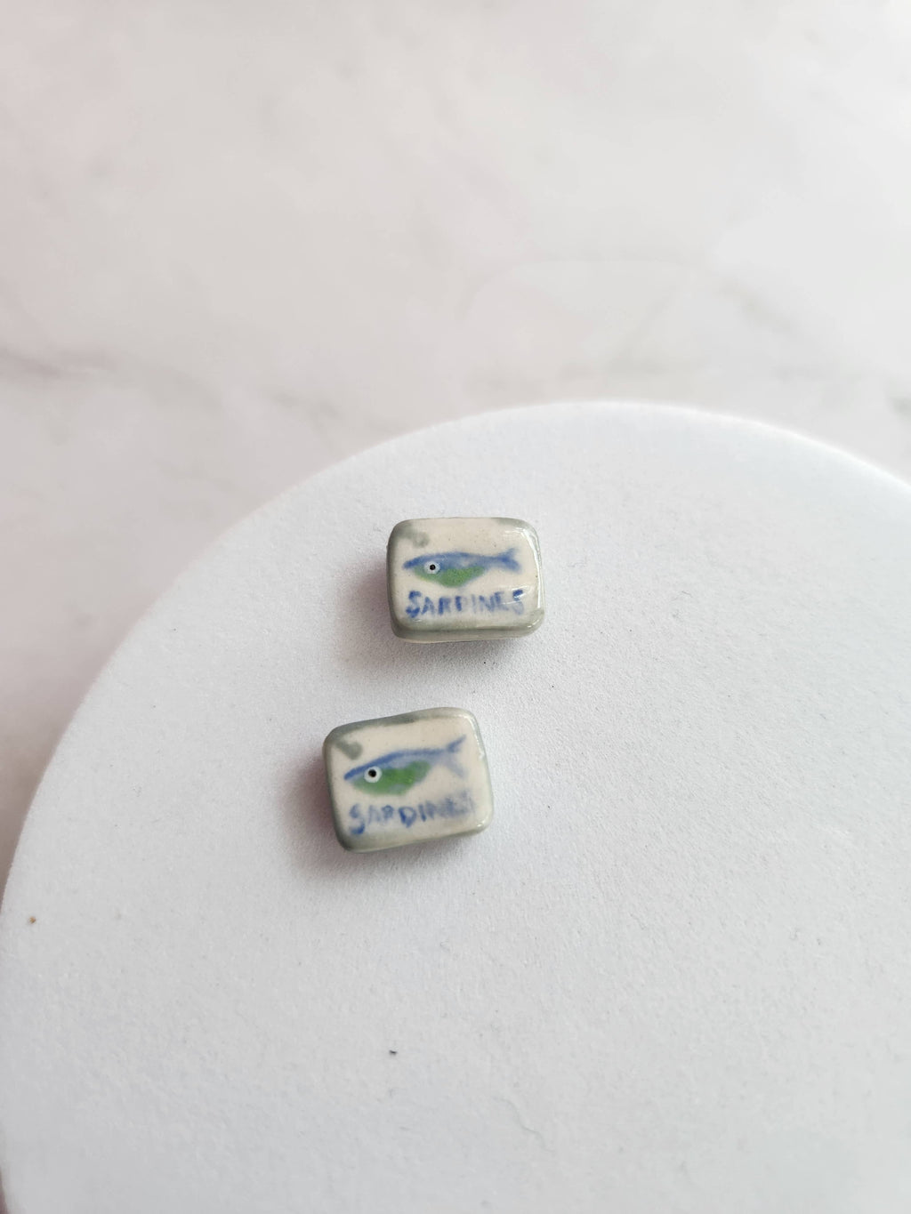 Sardine stud earrings